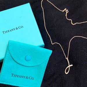 Tiffany & Co. “J” Pendant by Elsa Peretti